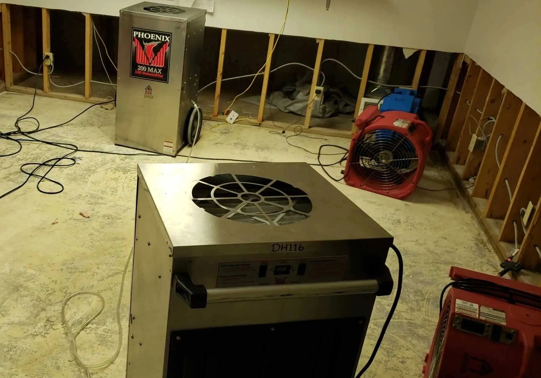 Water damage restoration with industrial drying equipment.